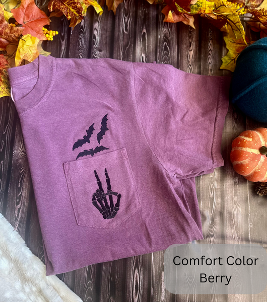 Skeleton Hands with Bats Pocket Tee