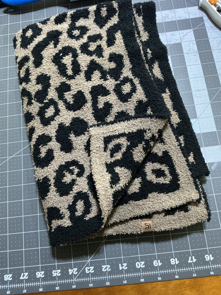 Black and tan baby blanket